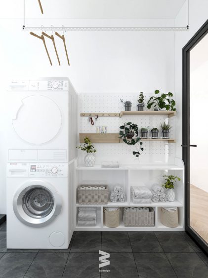 Khu vực giặt đồ với tông màu trắng sạch sẽ và gọn gàng hơn rất nhiều nhờ kệ treo tường tiết kiệm không gian trong căn hộ chung cư vinhomes smart city